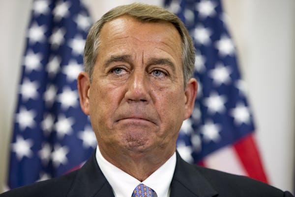 In this Sept. 9, 2015, photo, Speaker of the House John Boehner of Ohio, pauses while speaking about his opposition to the Iran deal during a news con