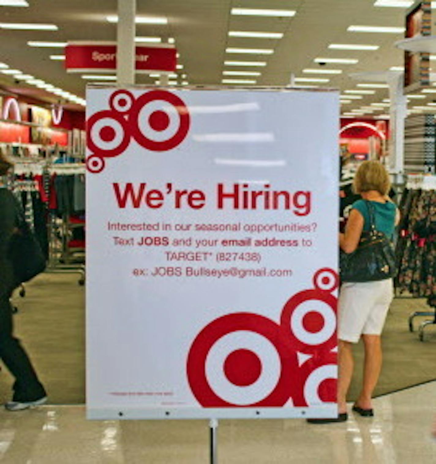 Target is among the companies using mobile technology to recruit seasonal help. Signs inside select Target locations in South Florida encourage seasonal job seekers to text "JOBS" and an email address to "Target" (827438) for more information. (Justine Griffin/Sun Sentinel/MCT)