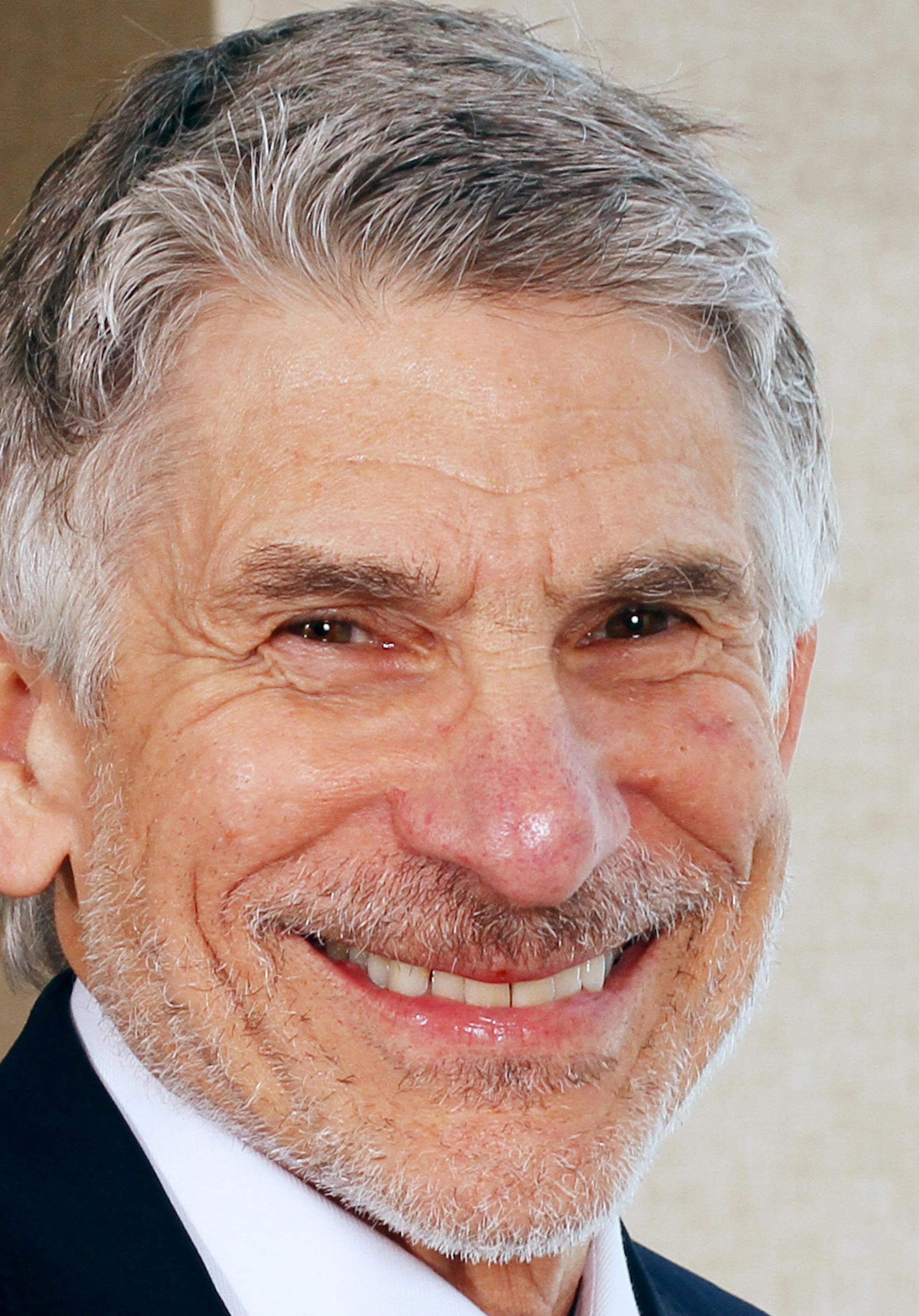 Environmental portrait of Michael R. Hoffman taken on Friday, March 8, 2013 on the St. Paul campus of the University of St. Thomas.