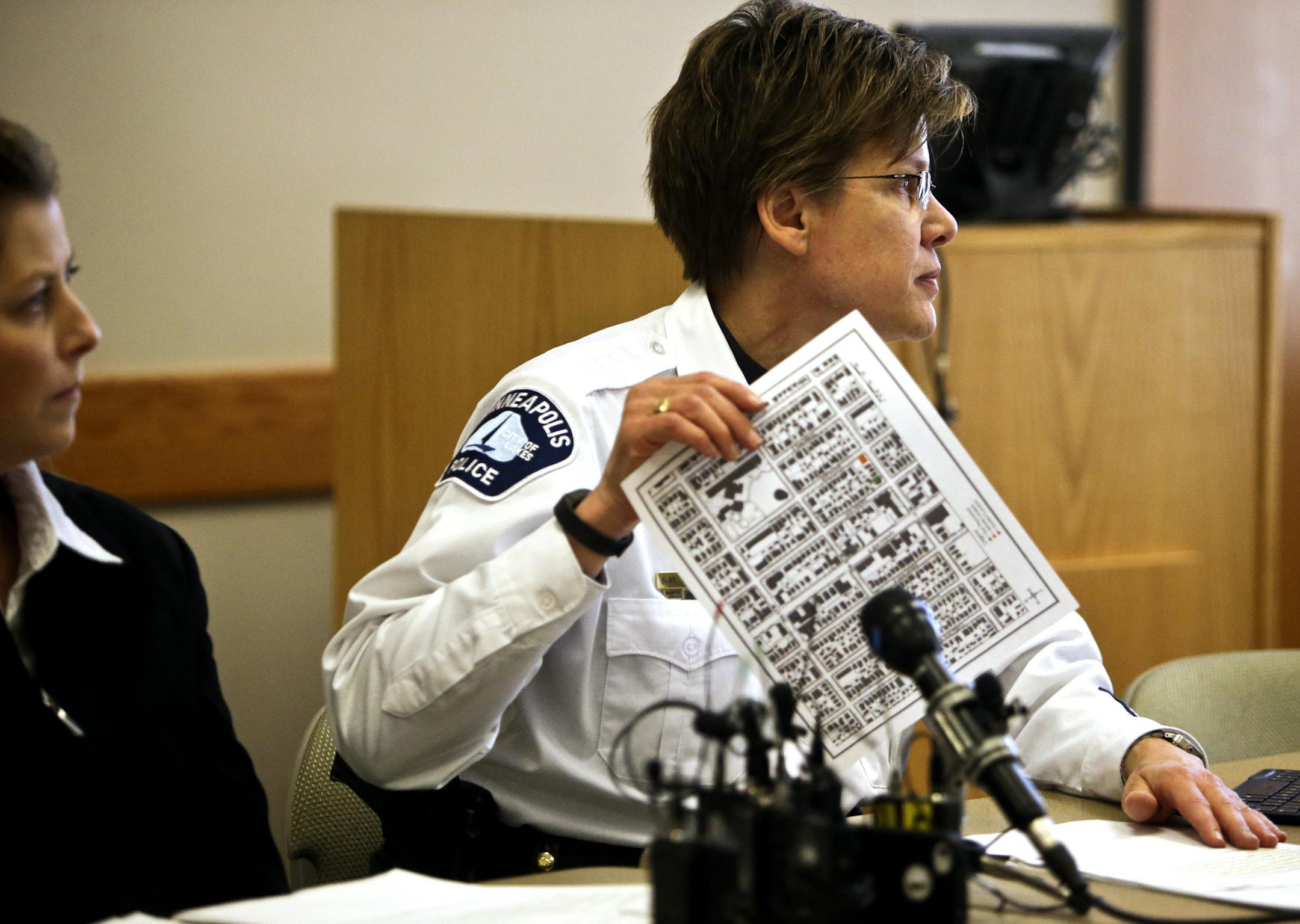 Minneapolis Deputy Chief Kris Arneson, right, talks about a recovered stolen handgun found in a sock on Oct. 28, 2013 that was "forensically-tied" to Terrance Franklin Wednesday, March 5, 2014, during a press conference at Minneapolis City Hall in Minneapolis, MN. On Tuesday, March 4, the Minnesota Bureau of Criminal Apprehension informed MPD that Franklin's DNA was found on the sock. Seated next to Arneson is MPD crime lab director Shannon Johnson.](DAVID JOLES/STARTRIBUNE) djoles@startribune.c