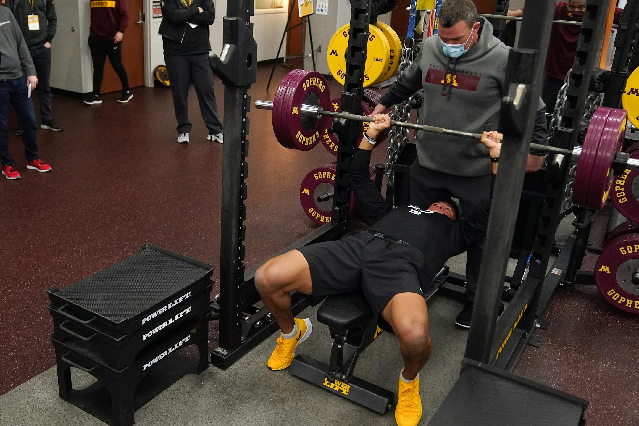 University of Minnesota cornerback Benjamin St-Juste lifted weights in front of NFL scouts during Pro Day.