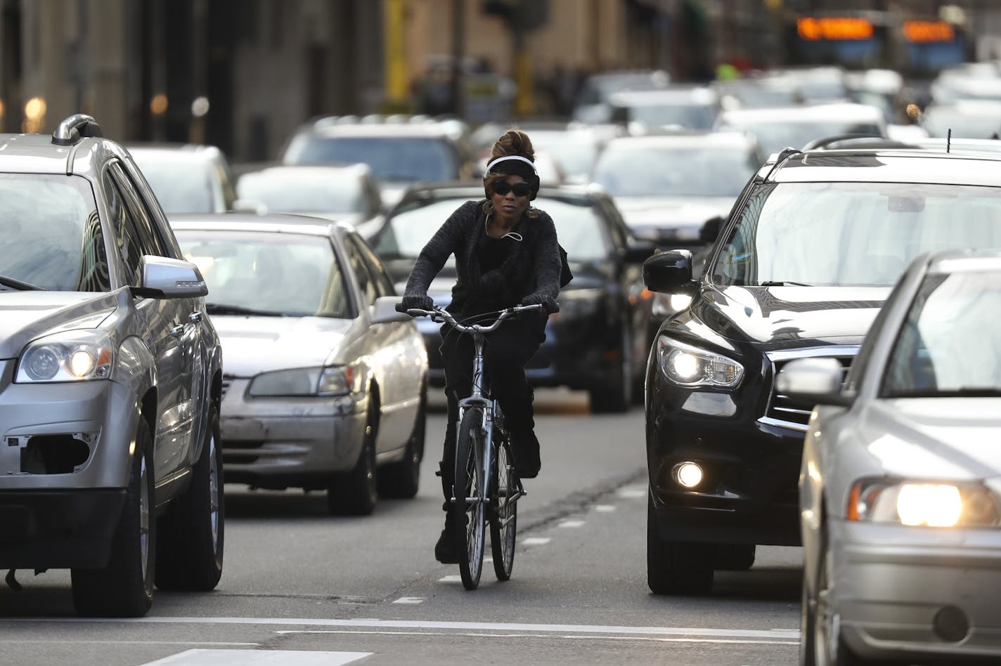 A bicycle commuter neared 3rd Ave. S. as she pedaled on S. 6th St. Monday evening. ] JEFF WHEELER &#xef; jeff.wheeler@startribune.com A University of Minnesota study has found that commuting by bicycle has a significant impact not only on health, but on manufacturing and tourism as well. Bicyclists of all kinds downtown during the evening commute Monday, March 27, 2017 in Minneapolis.