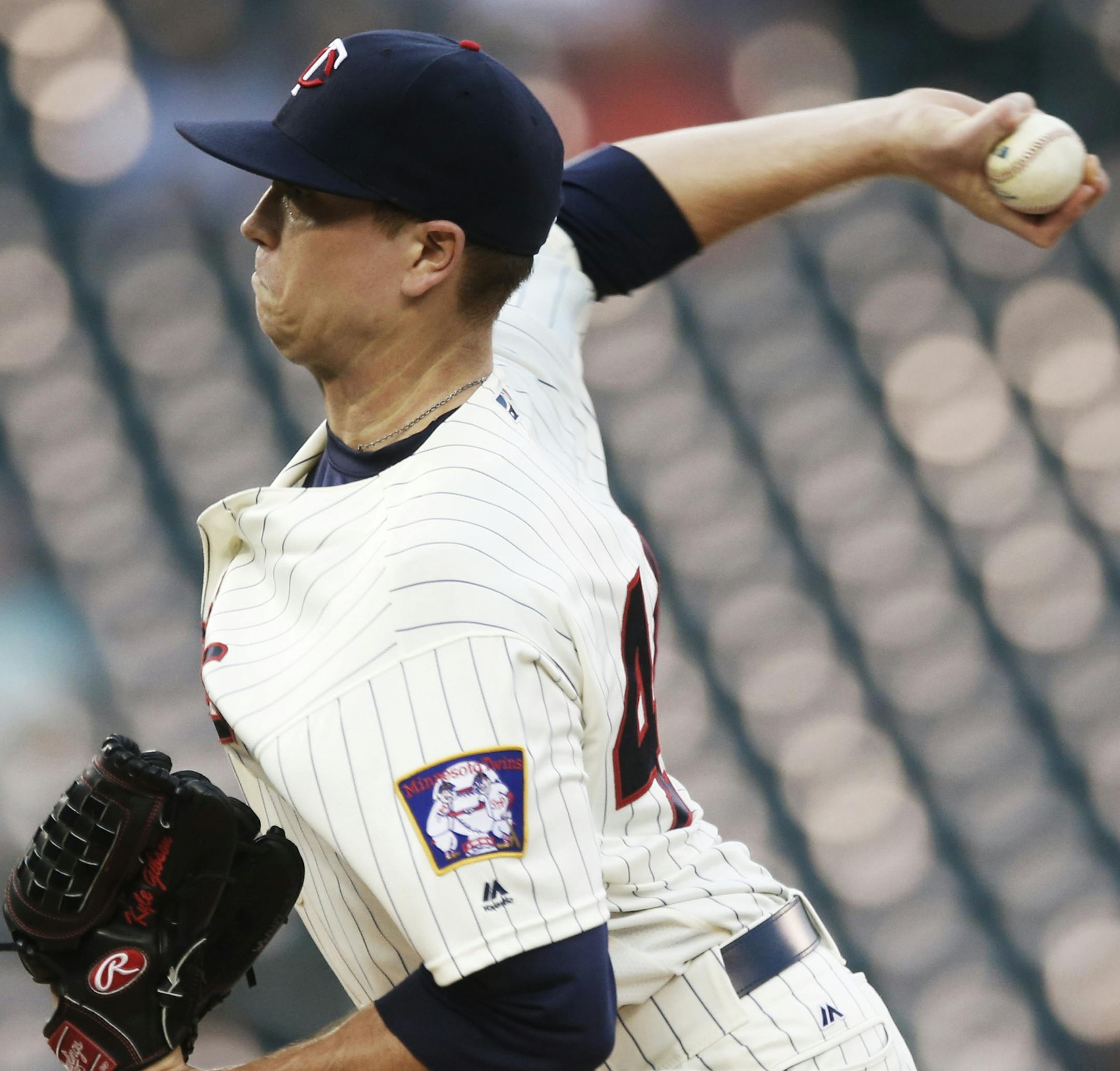 Minnesota Twins pitcher Kyle Gibson throws against the Kansas City Royals in the first inning of a baseball game Wednesday, Sept. 7, 2016, in Minneapolis. (AP Photo/Jim Mone)