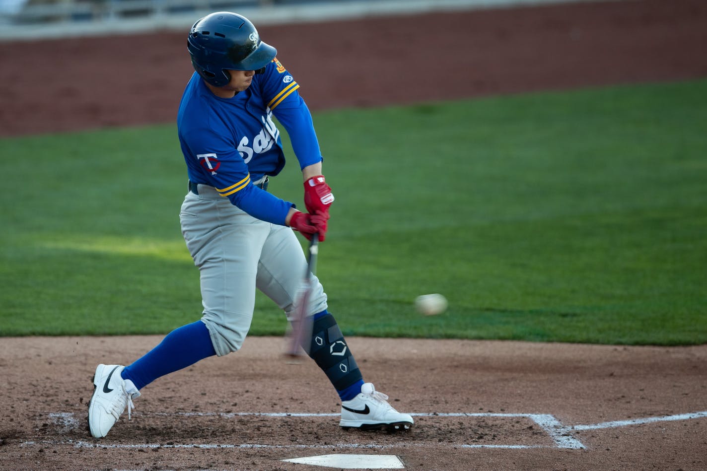 St. Paul's Rob Refsnyder bats in the season opener at Werner Park in Papillion, Nebraska, on Tuesday. The Omaha Storm Chasers won the game 8-2.