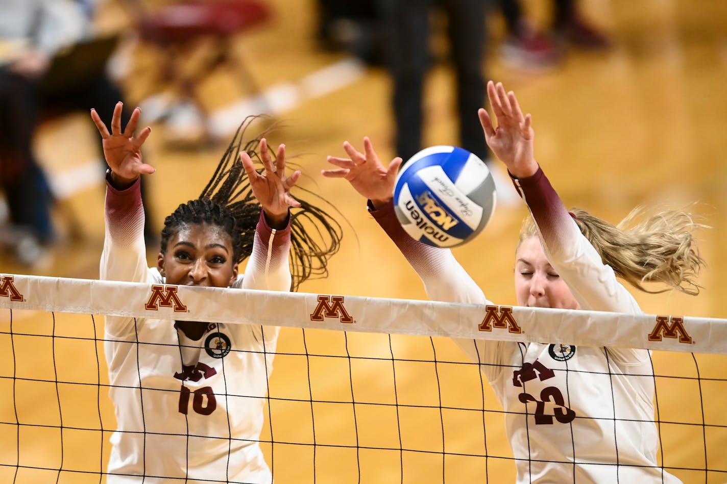 Stephanie Samedy (10) and Katie Myers (23) jumped for a block against Michigan State earlier this season.