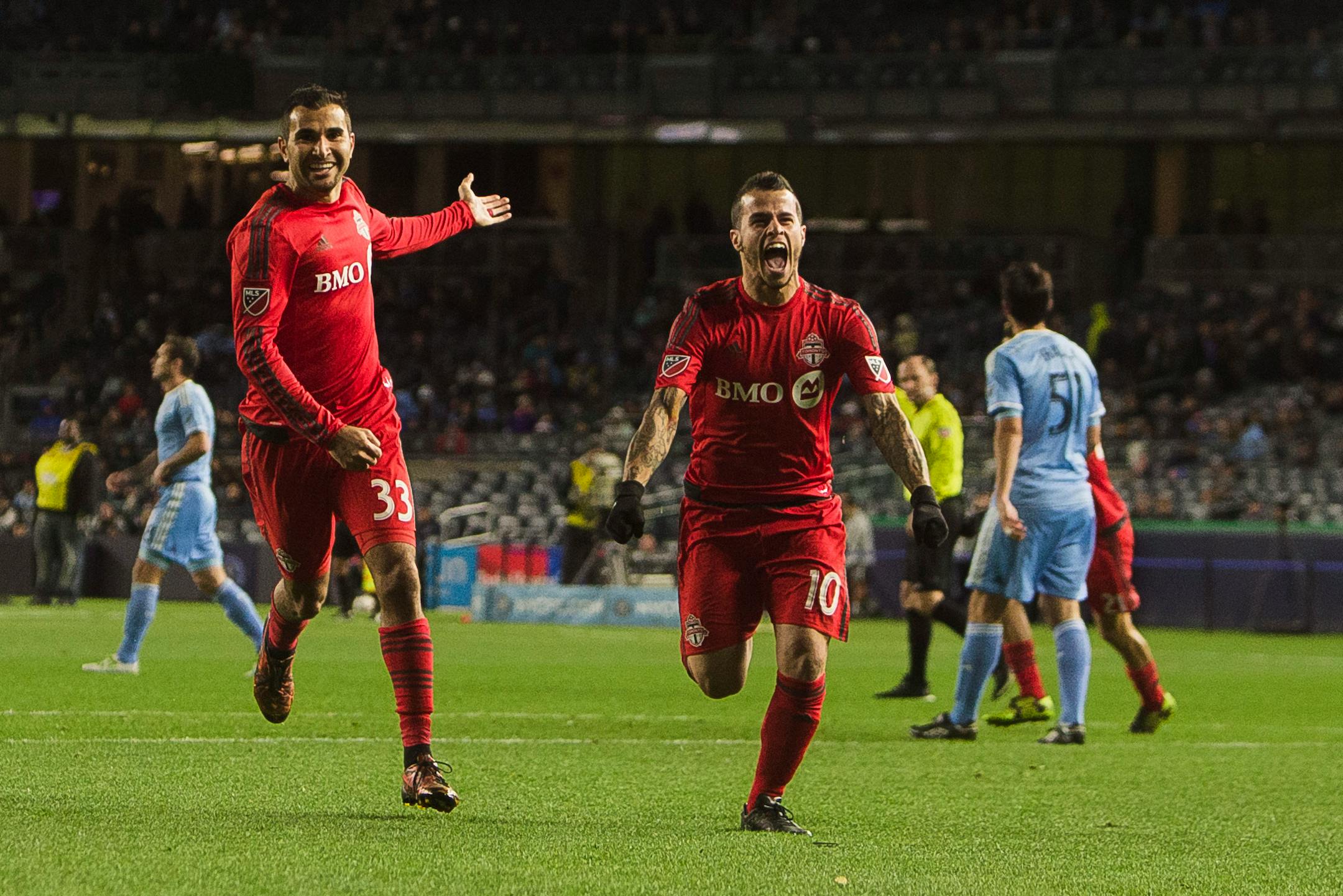 Toronto FC Sebastian Giovinco (10) center right, celebrates his goal during a MLS second leg eastern semifinals soccer match against New York City FC in New York, Sunday, Nov. 6, 2016. (AP Photo/Andres Kudacki) ORG XMIT: NYAK138