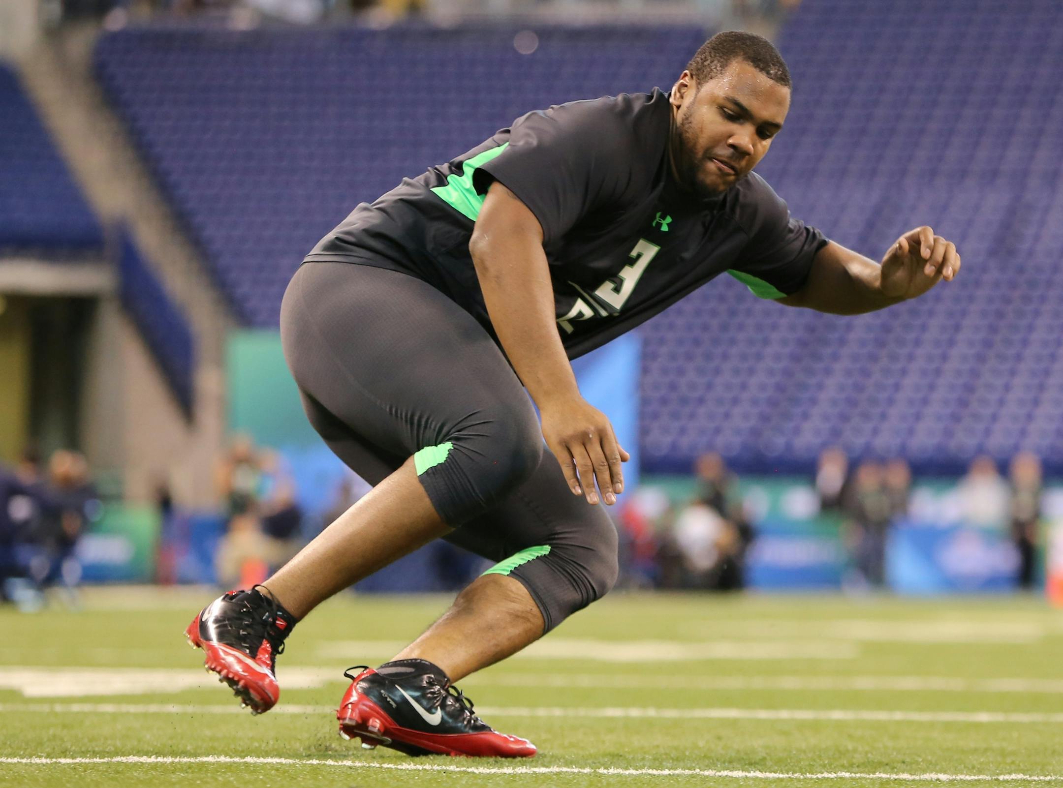 Western Michigan offensive lineman Willie Beavers during a drill at the NFL football scouting combine Friday, Feb. 26, 2016, in Indianapolis. (AP Photo/Gregory Payan) ORG XMIT: INDC1