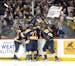 Mahtomedi players celebrated a goal by Mahtomedi forward Adam Johnson in the second period.