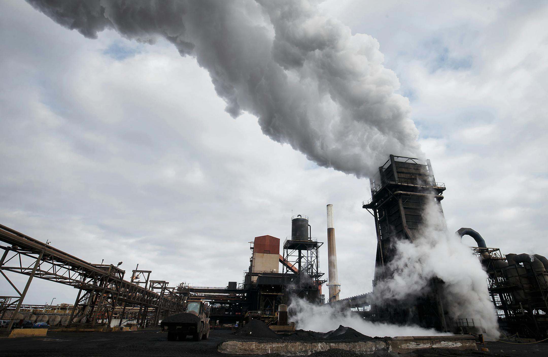 Steam rises from a coke quenching tower at the Stelco Holdings plant in Nanticoke, Ontario, Canada, on Nov. 14, 2017. (MUST CREDIT: Cole Burston/Bloomberg) ORG XMIT: 775087511