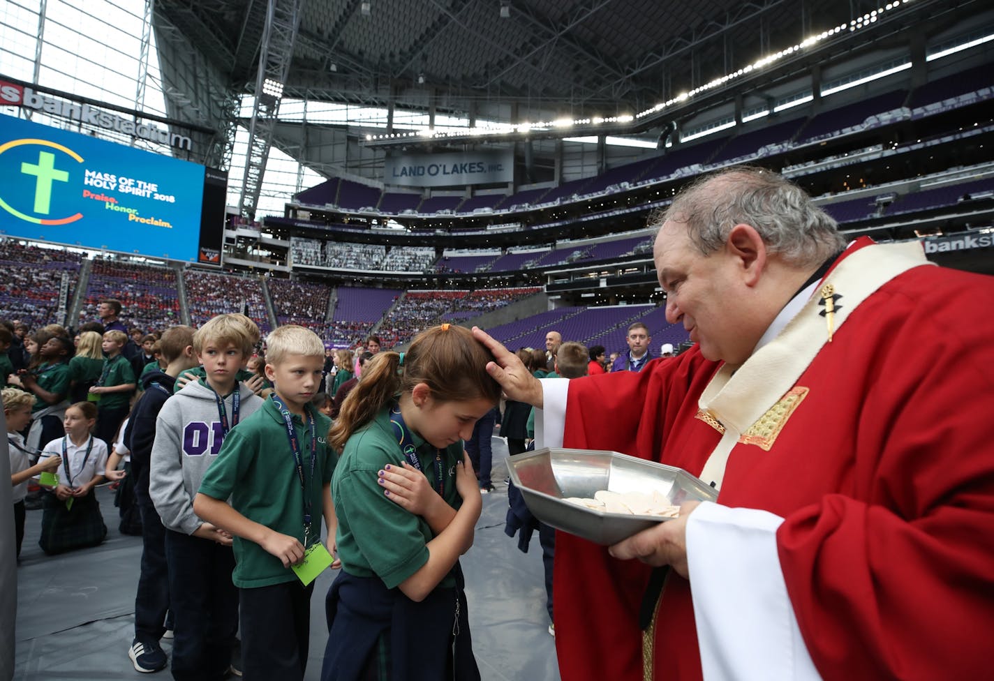 Bishop Bernard Hebda of the Archdiocese of Saint Paul and Minneapolis gave Holy Communion to 12,000 Catholic school children that gathered for Mass of the Holy Spirt at U.S. Bank Stadium Wednesday October 10, 2018 in Minneapolis, MN.