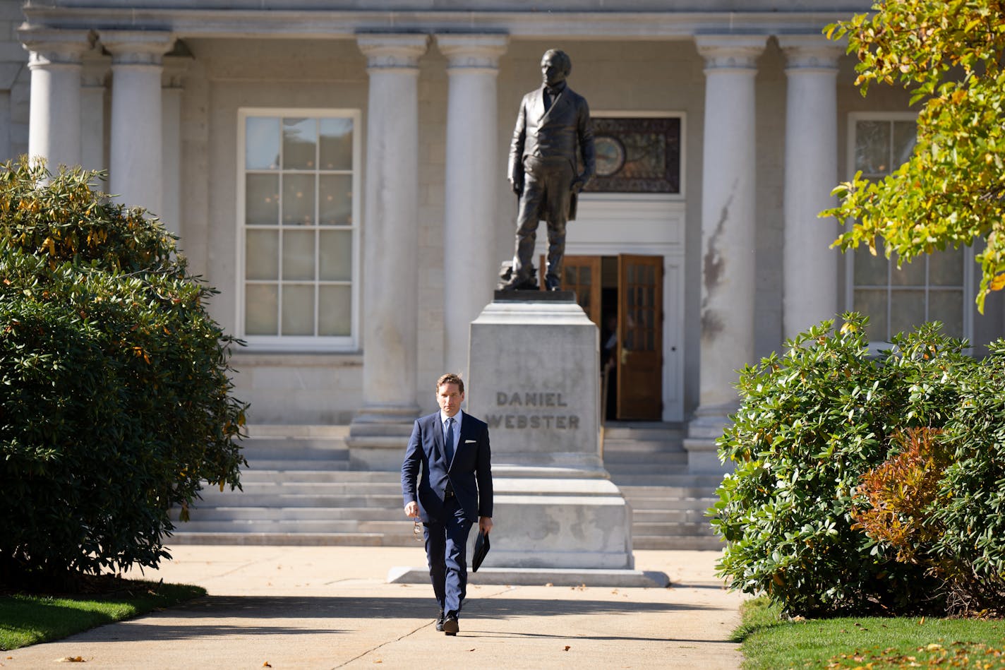 After signing a declaration of candidacy to run for president, Dean Phillips walked out of the New Hampshire Statehouse to address the crowd on Friday.