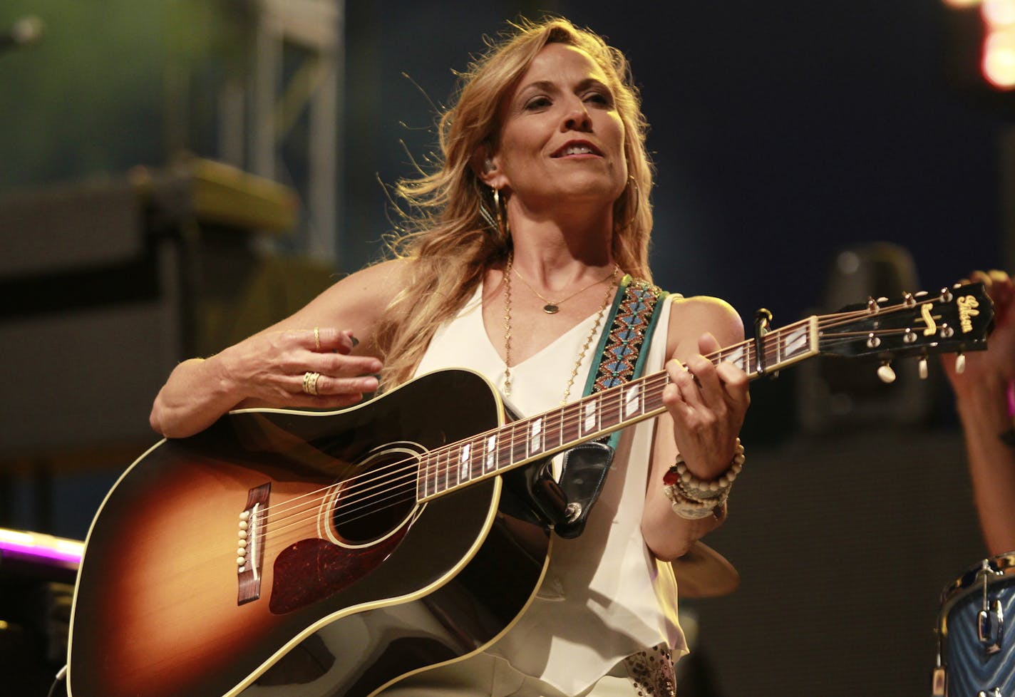 Sheryl Crow performs at the Taste of Country at Coca Cola field on Friday, June 14, 2013 in Buffalo, N.Y..(AP Photo/The Buffalo News, Harry Scull Jr.) TV OUT; MAGS OUT; MANDATORY CREDIT; BATAVIA DAILY NEWS OUT; DUNKIRK OBSERVER OUT; JAMESTOWN POST-JOURNAL OUT; LOCKPORT UNION-SUN JOURNAL OUT; NIAGARA GAZETTE OUT; OLEAN TIMES-HERALD OUT; SALAMANCA PRESS OUT; TONAWANDA NEWS OUT ORG XMIT: MIN2013062508335804