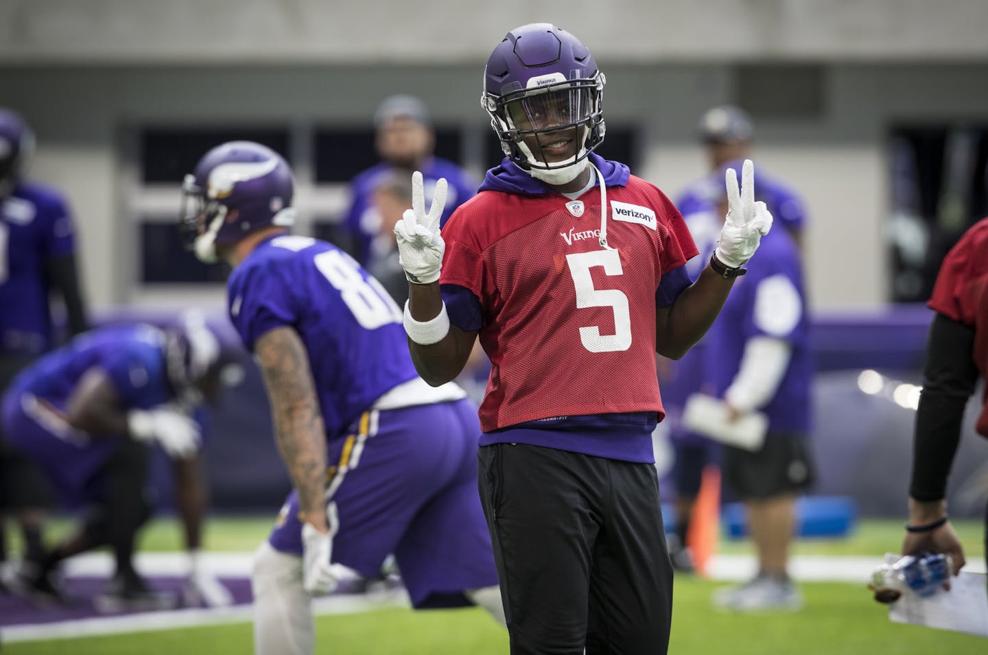 Teddy Bridgewater gave peace signs during Vikings practice at U.S. Bank Stadium in Minneapolis, Minn., on August 26, 2016.