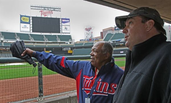 (left to right) Former Twins stars Tony Oliva and Kent Hrbek visited the Twins dugout at Target Field on a rainy day. The two gave their thoughts on t
