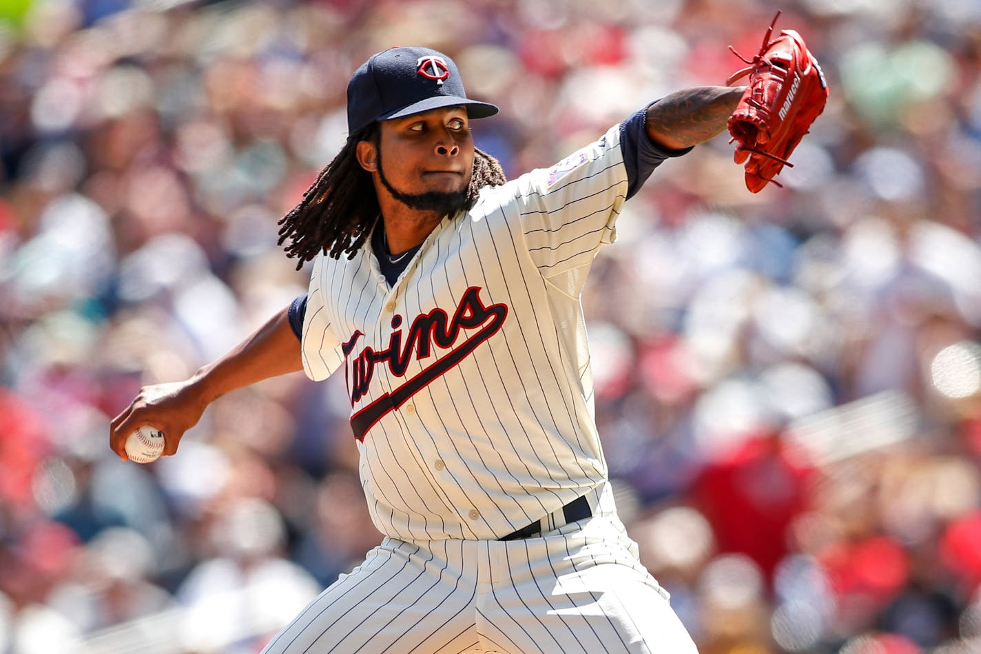 Minnesota Twins starting pitcher Ervin Santana delivers to the Pittsburgh Pirates in the fifth inning of a baseball game Wednesday, July 29, 2015, in Minneapolis. The Pirates won 10-4. (AP Photo/Bruce Kluckhohn)