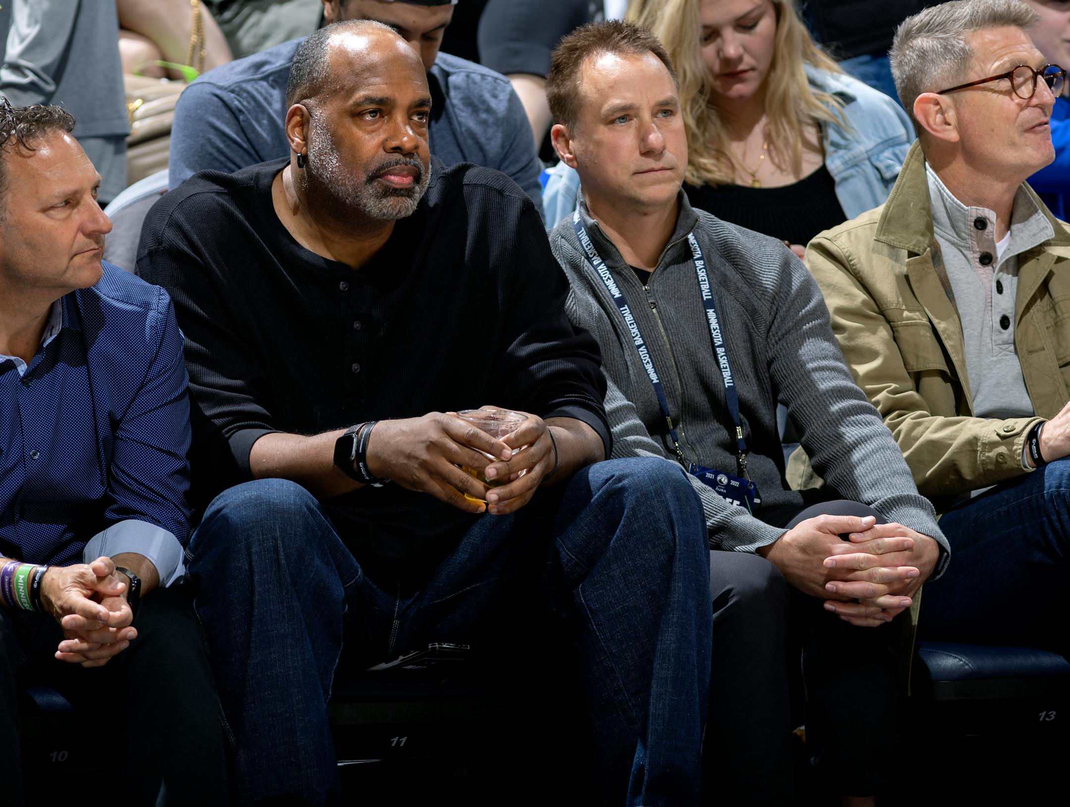 Former Minnesota Timberwolves player Dean Garrett watches the game Sunday.