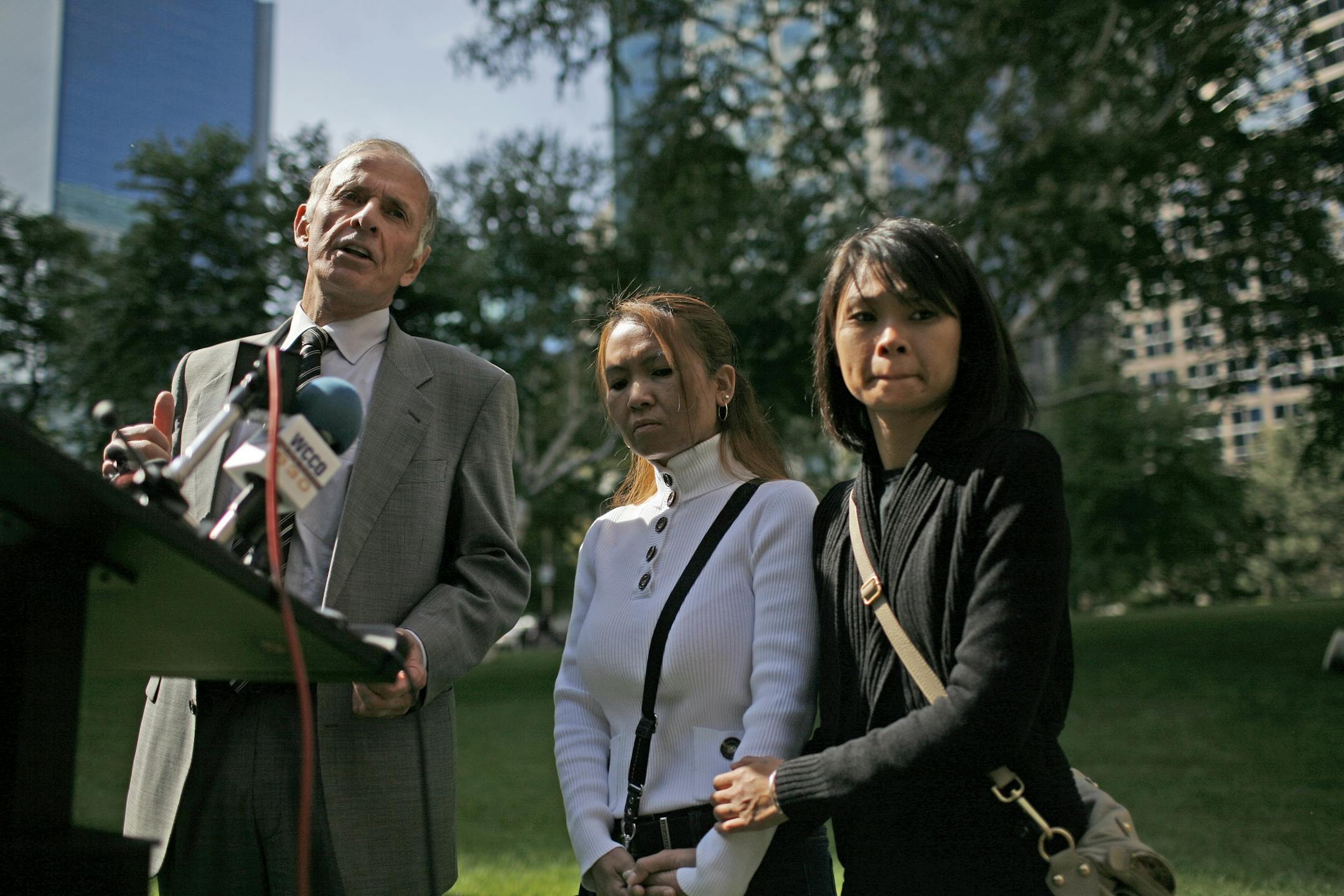 Attorney James Schwebel addresses the media at a press conference Thursday about developments in the death of Anousone Phanthavong, 38, of Roseville, on the night of Aug. 23. At his right are family members of the deceased, Vilayphone Phanphavong and Sousksavanh Phanphavongat., Anousone Phanthavong, a motorist who pulled onto a dark Minneapolis interstate ramp last month to put gasoline in his car was hit and killed by a passing car. Amy Senser, the wife of former Minnesota Viking Joe Senser, wa