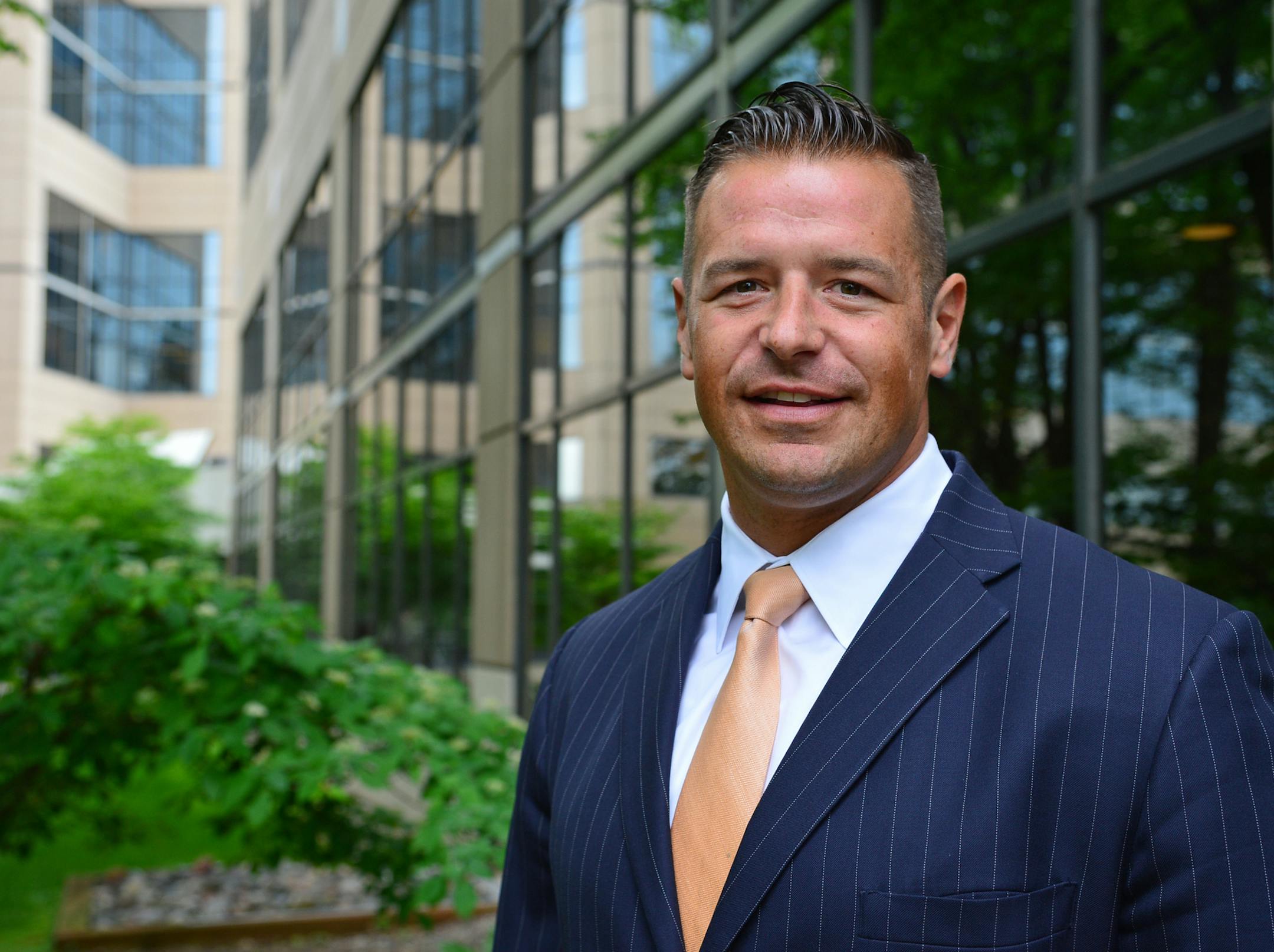 John Hoffman, 37, regional managing director of the Minnesota region for Des Moines-based Principal Financial Group, discusses how multi-generational teams of workers can work together and enhance sales and organizational culture. Hoffman, who once considered law or foreign relations, is one of the youngest regional managers nationally for Principal. Richard.Sennott@startribune.com Richard Sennott/Star Tribune Minnetonka Minn.Minday 6/09/2014) ** (cq)