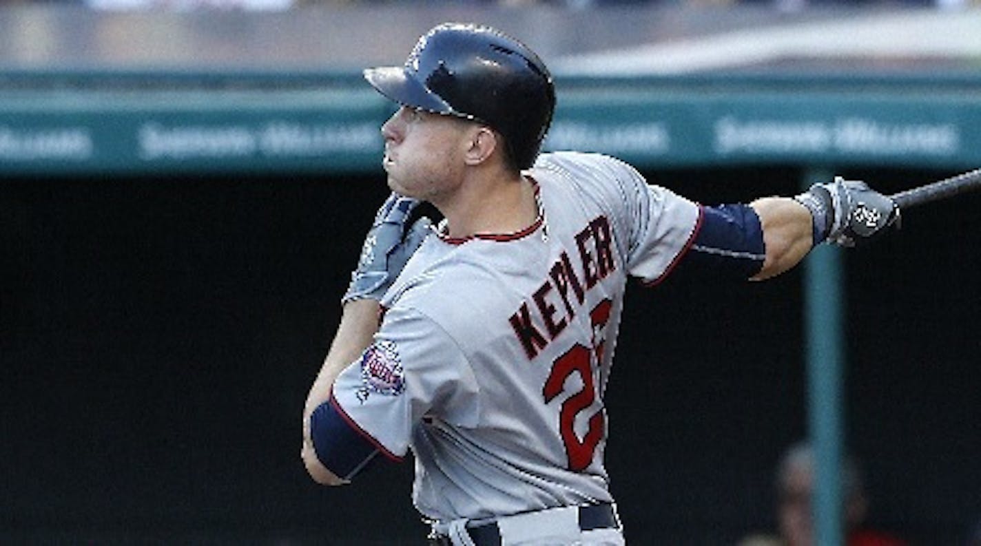 Minnesota Twins' Max Kepler watches his two run home run off Cleveland Indians starting pitcher Danny Salazar during the first inning of a baseball game, Monday, Aug. 1, 2016, in Cleveland. (AP Photo/Ron Schwane)