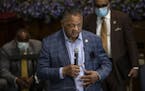 The Rev. Jesse L. Jackson, left, and his son met with faith leaders to send a message of solidarity and demand justice in the death of George Floyd at