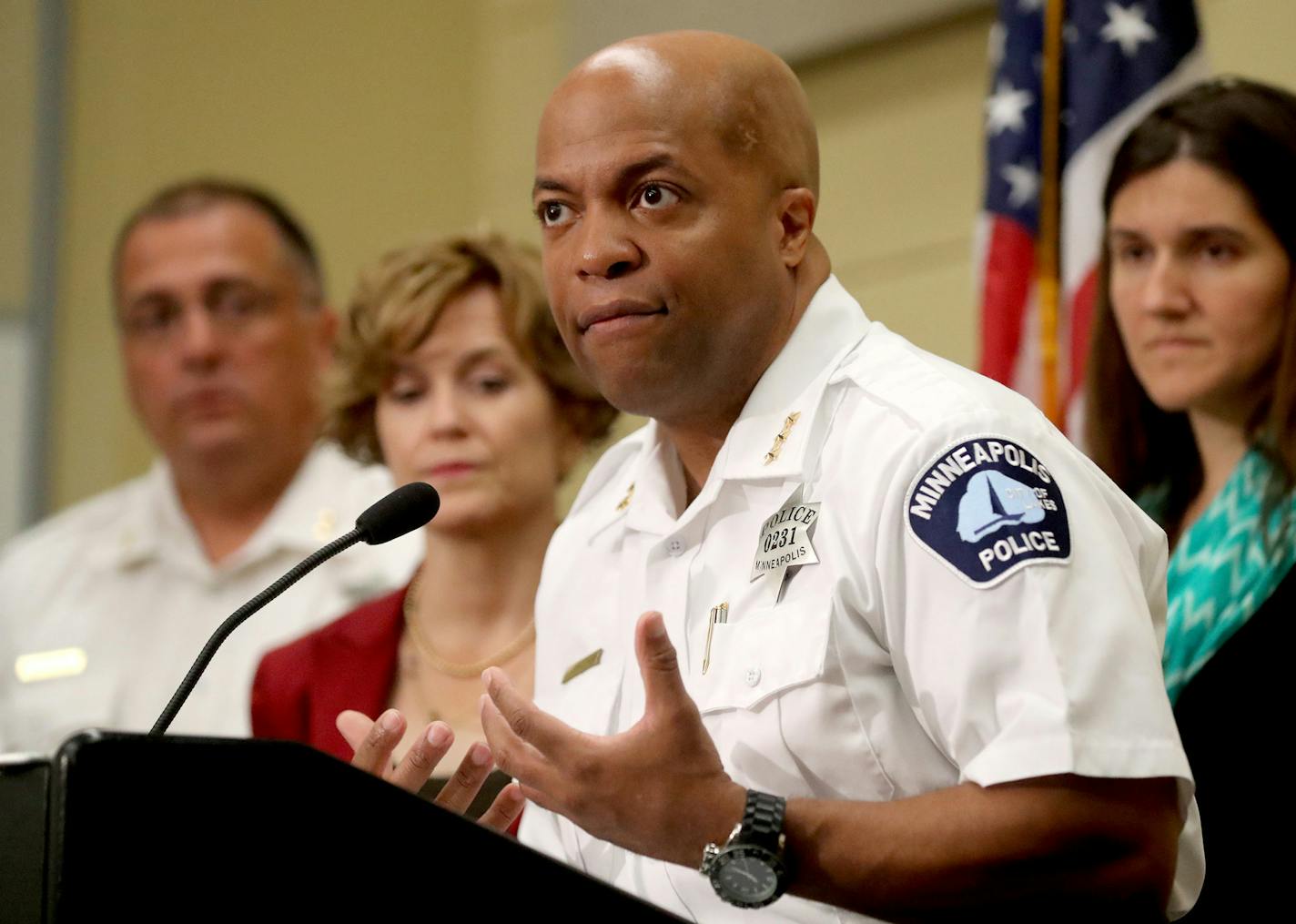 As Minneapolis mayor Betsy Hodges looks on, acting Police Chief Medaria Arradondo announces that Minneapolis police will be required to activate their body cameras on all calls and the department will start implementing the new rule starting Saturday, on Wednesday, July 26, 2017, at the Minneapolis Emergency Operations Training Facility in Minneapolis. (David Joles/Minneapolis Star Tribune/TNS) ORG XMIT: 1207357 ORG XMIT: MIN1707261905166504