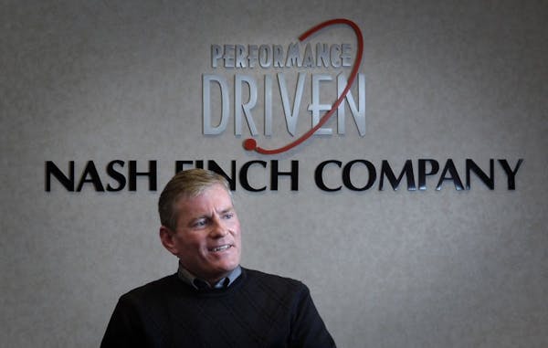 Nash Finch was acquired by Spartan Stores, the firms said Monday. Nash Finch CEO Alec Covington, shown in a 2006 file photo, will be an advisor to the