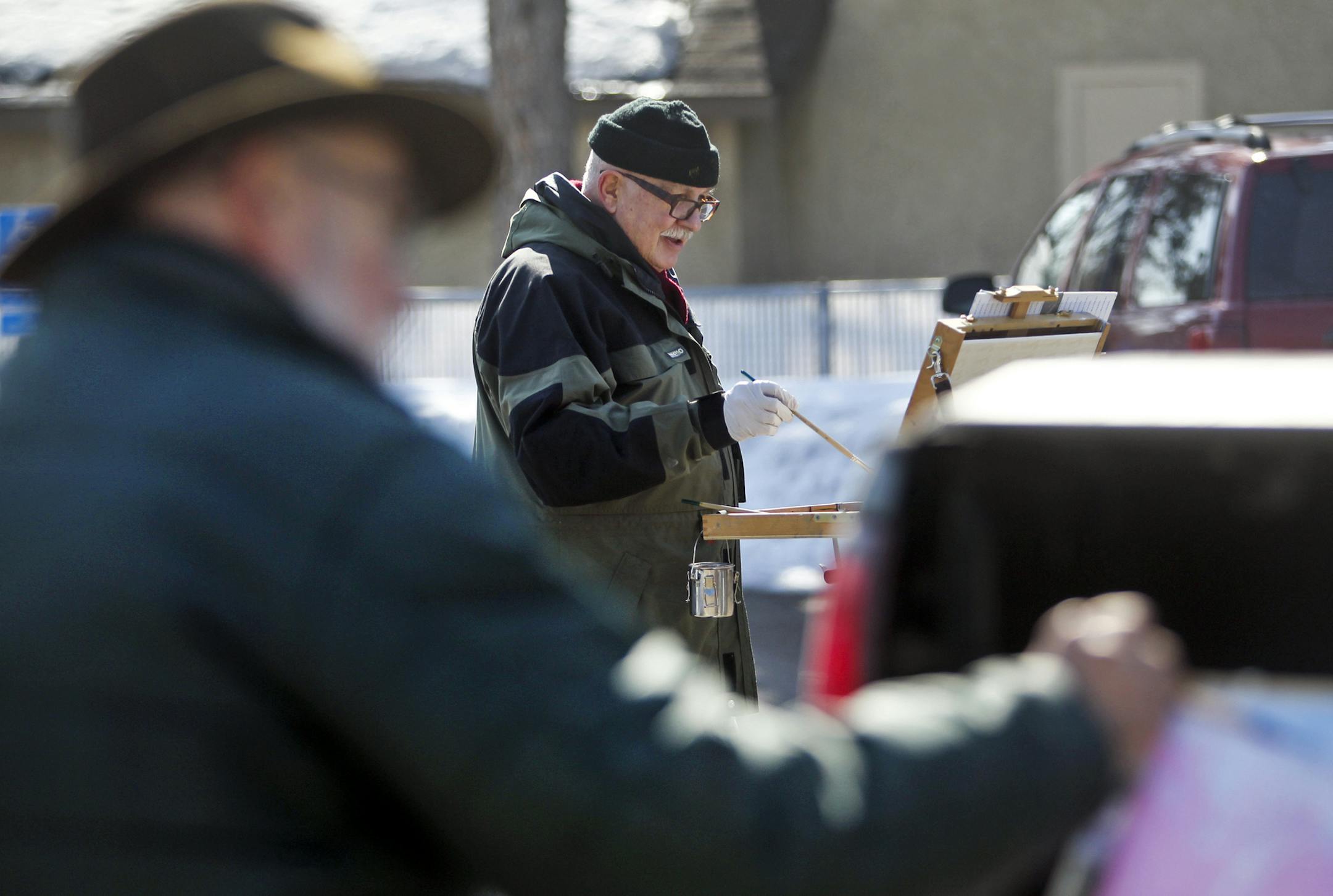 Painters Paul Boetcher, left, and Tom Dimock painted a scene of mix conifers during a gathering of "en plein air" painters. Members of the group gather year round weekly on Thursdays to paint -- rain or shine. They were photographed Thursday, March 28, 2013, at Banfille-Locke Center for the arts in Fridley, MN.] (DAVID JOLES/STARTRIBUNE) djoles@startribune.com Several "en plein air" painters, meaning they work outside, and this group does it year-round, cold weather or not, gathered Thursday, Ma