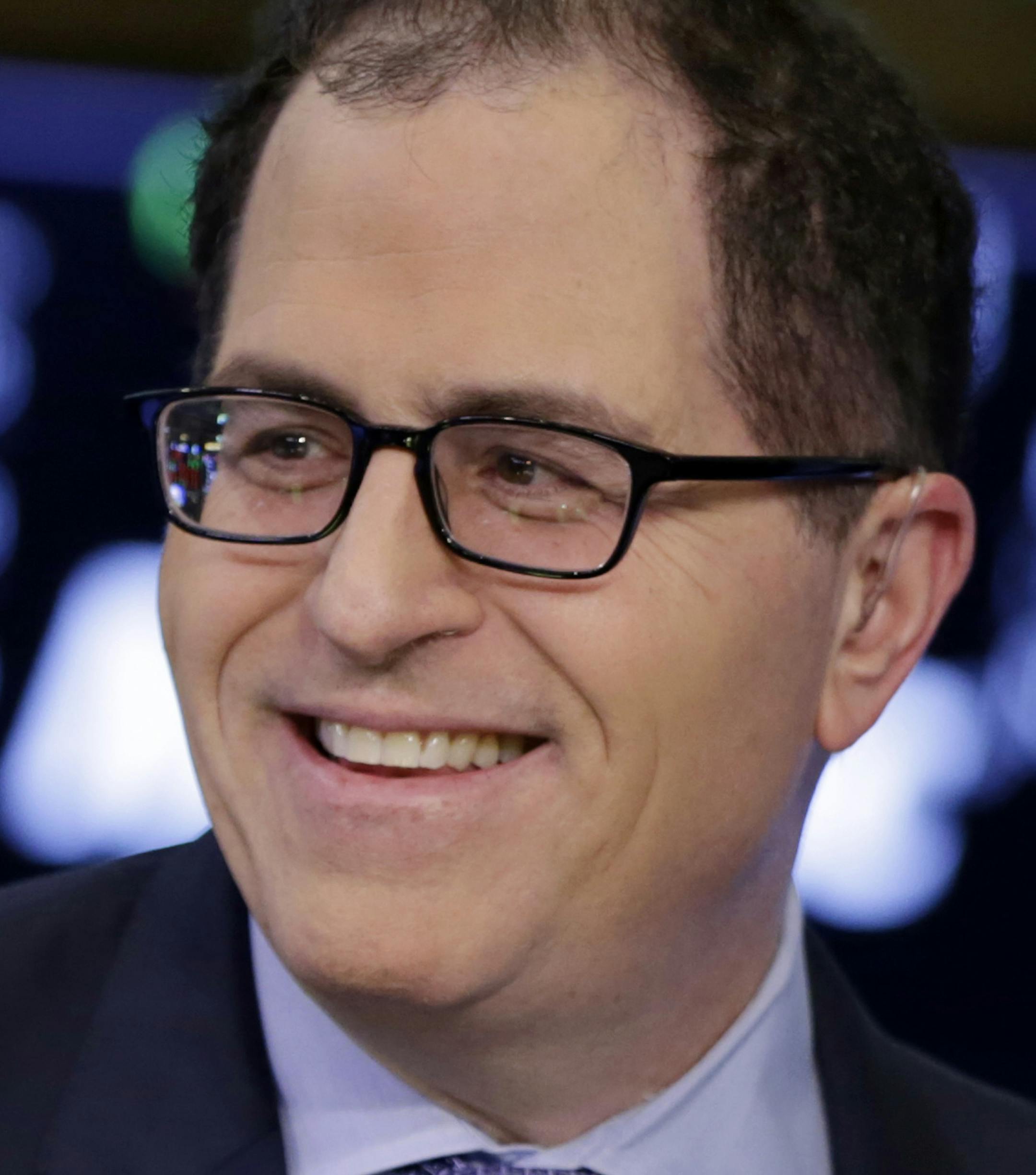 Michael Dell, CEO of Dell Technologies, is interviewed on the floor of the New York Stock Exchange, Monday, July 2, 2018. Dell is going public again after a five-year sojourn as a privately held company. (AP Photo/Richard Drew) ORG XMIT: NYRD111