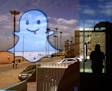 The Snapchat logo seems to float over Ocean Front Walk in Los Angeles' Venice neighborhood in 2013. (Genaro Molina/Los Angeles Times/TNS) ORG XMIT: 11