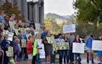 People protested mask requirements in schools at the state capitol in Helena, Mont., Oct. 1, 2021. 