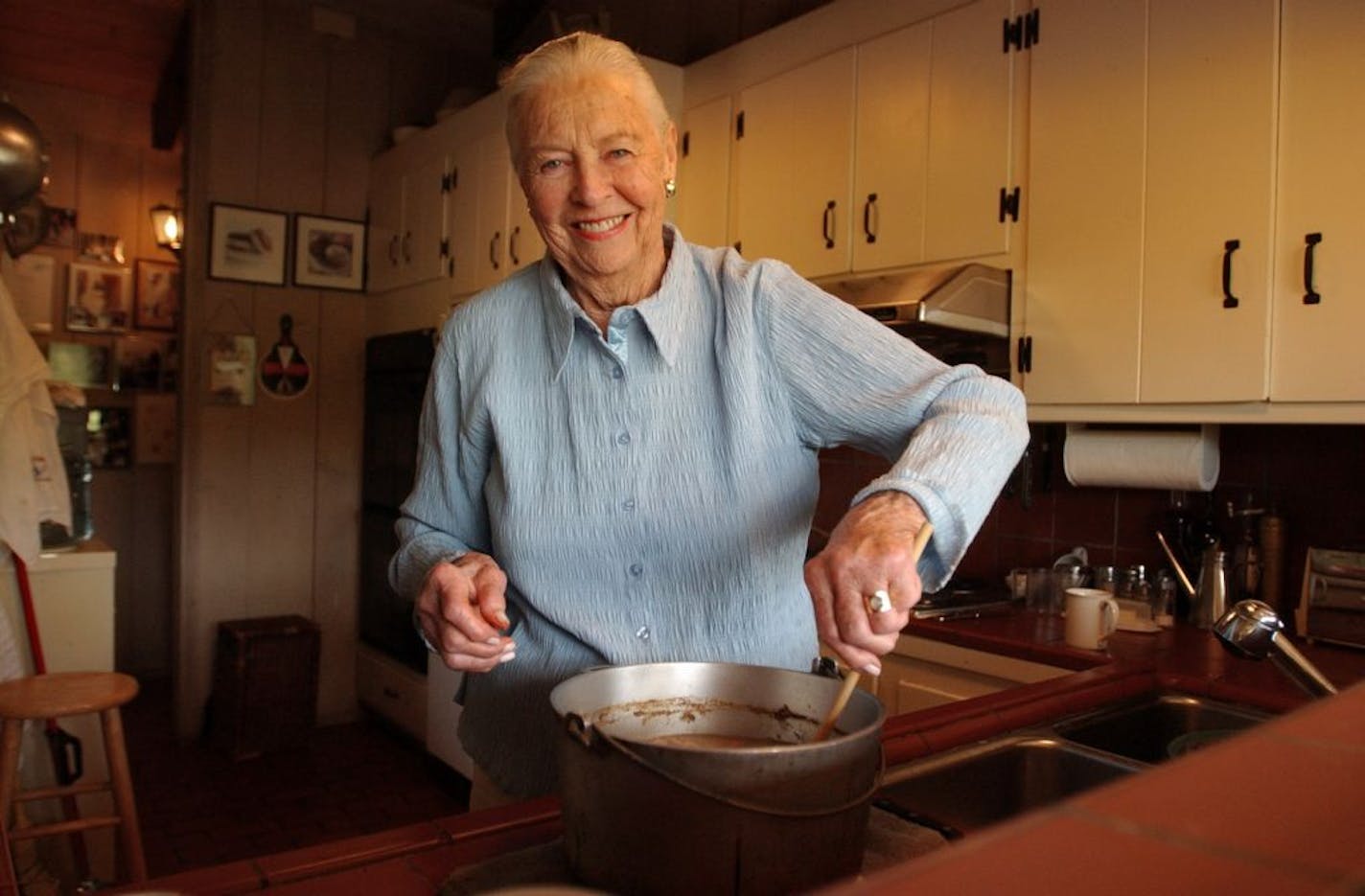 FILE - This May 27, 2004 file photo shows Marion Cunningham, a venerated figure in the food world, at home in Walnut Creek, Calif. Cunningham, the home-cooking champion whose legacy can be found in the food-spattered pages of "Fannie Farmer" cookbooks in kitchens across America, died of complications from Alzheimer's disease, a family friend told the San Francisco Chronicle. She was 90.