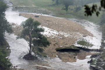 BRIAN PETERSON &#x2022; Brianp@startribune.com
Rushford, MN - 8/19/2007
A car found in Rush Creek (top left) south of I-90 west of Wilson is believed 