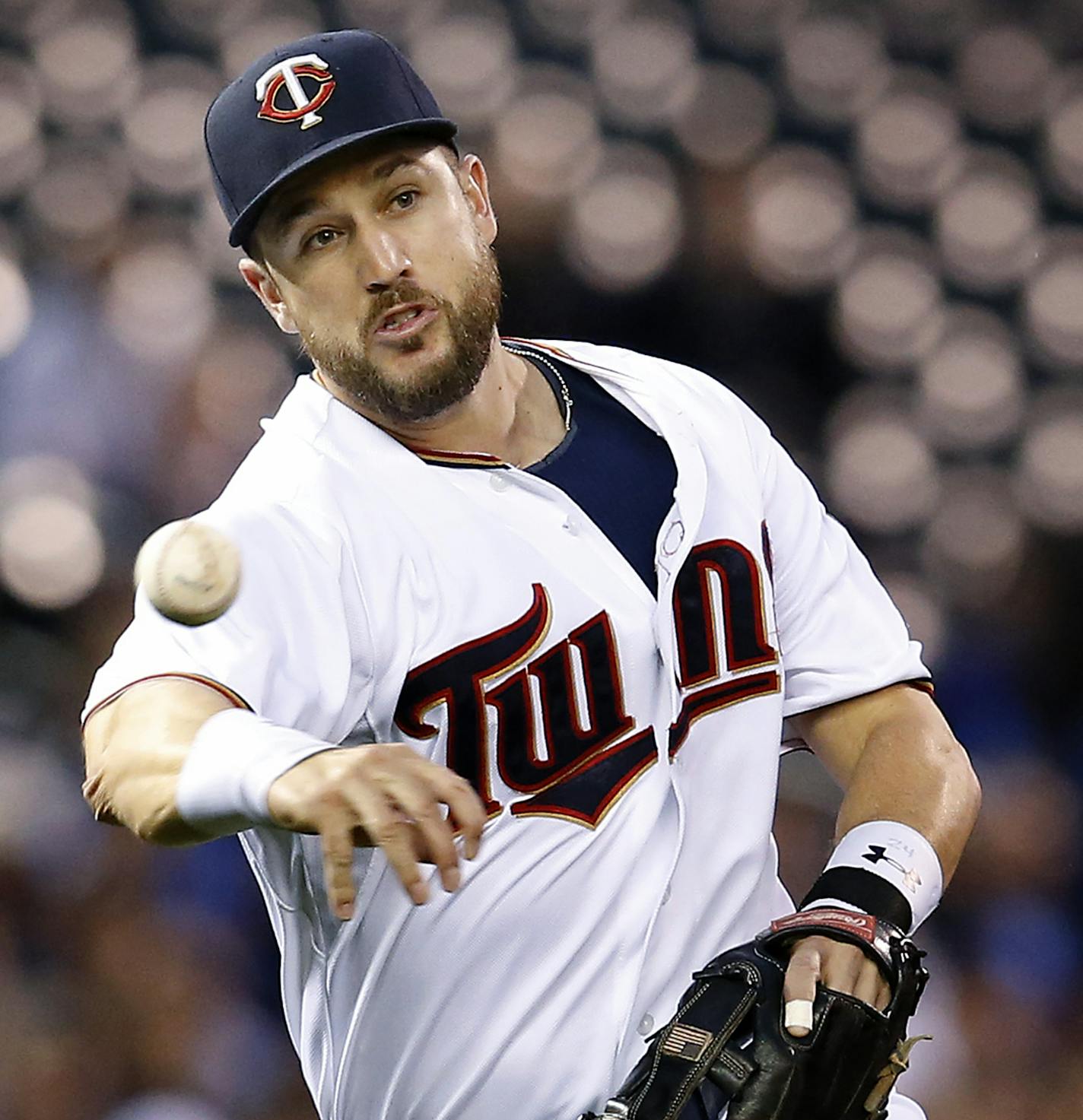 Twins third baseman Trevor Plouffe (24) threw out Dustin Pedroia (15) in the first inning. ] CARLOS GONZALEZ cgonzalez@startribune.com, May 26, 2015, Minneapolis, MN, Target Field, MLB, Minnesota Twins vs. Boston Red Sox