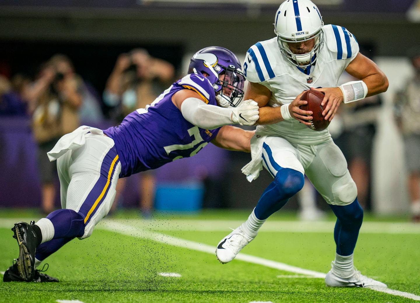 Minnesota Vikings defensive end Kenny Willekes (79) flushed Indianapolis Colts quarterback Jacob Eason (9) out of the pocket in the second half of an Aug. 21 preseason game.