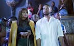 Jussie Smollett, right, with Taraji P. Henson, plays the gay son of Empire Records founder Lucious Lyon (Terrence Howard) on "Empire."