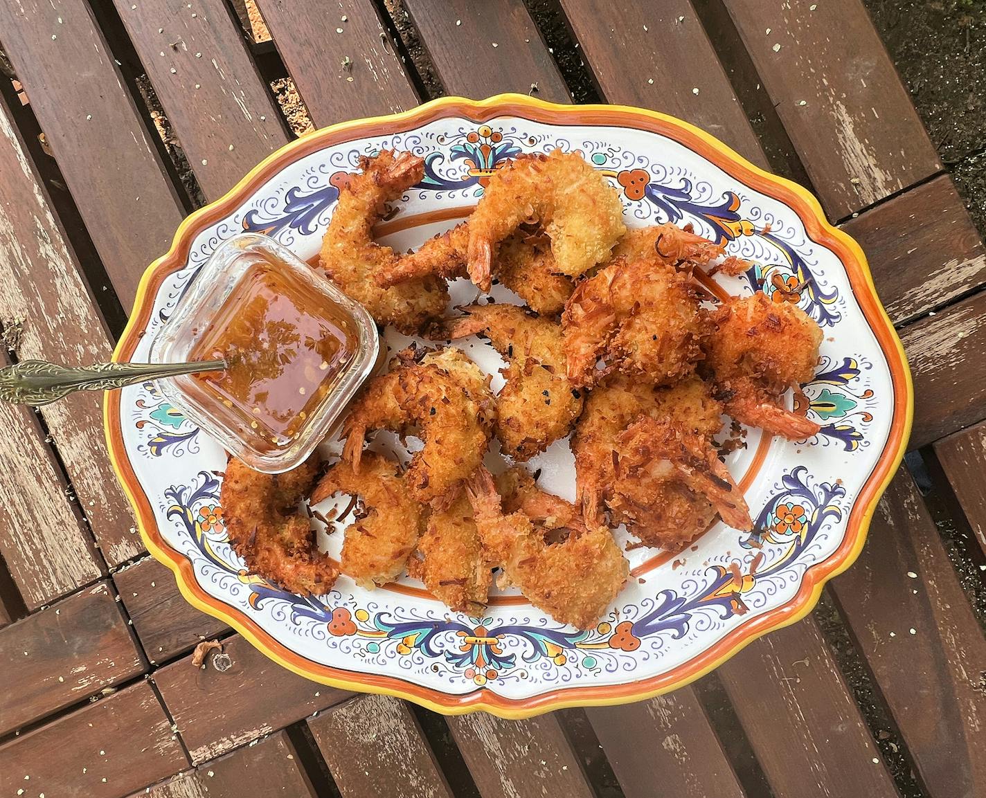 Golden, sweet and crispy, coconut shrimp is a favorite party finger food. (Gretchen McKay/Pittsburgh Post-Gazette/TNS)