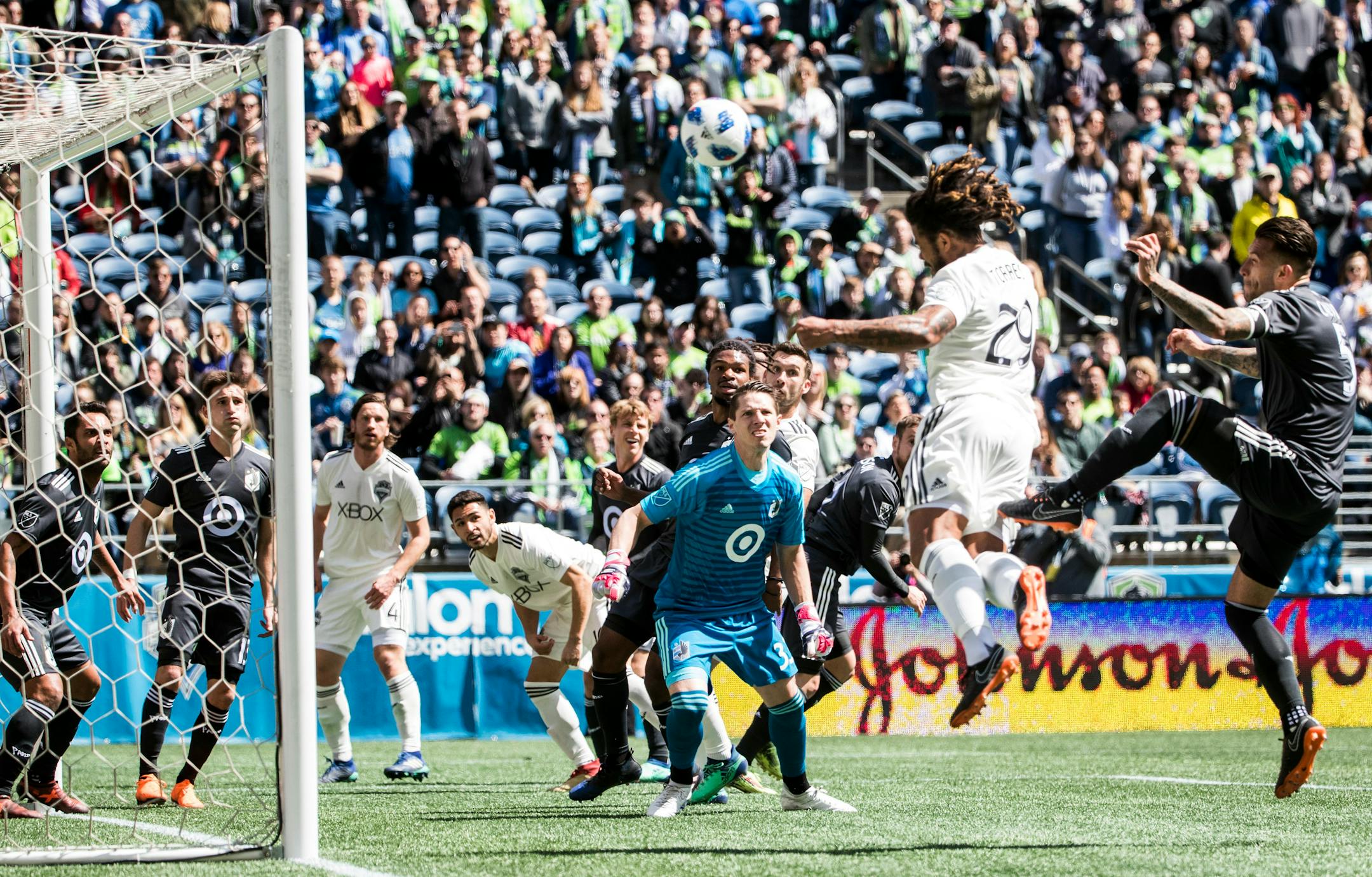 Sounders defender Roman Torres (29) just missed a header from a cross by midfielder Nicolas Lodeiro during Seattle's 3-1 victory over Minnesota United on Sunday.