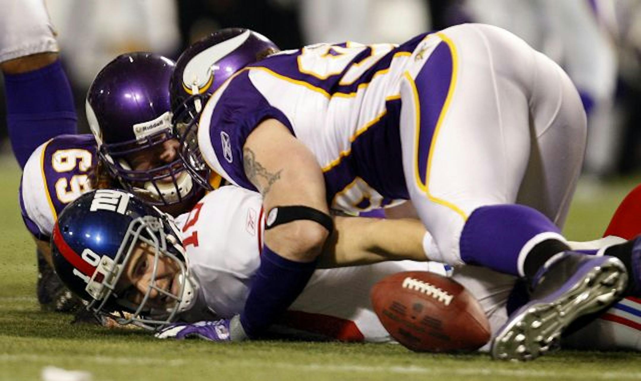 Giants quarterback Eli Manning was sacked by Brian Robison.