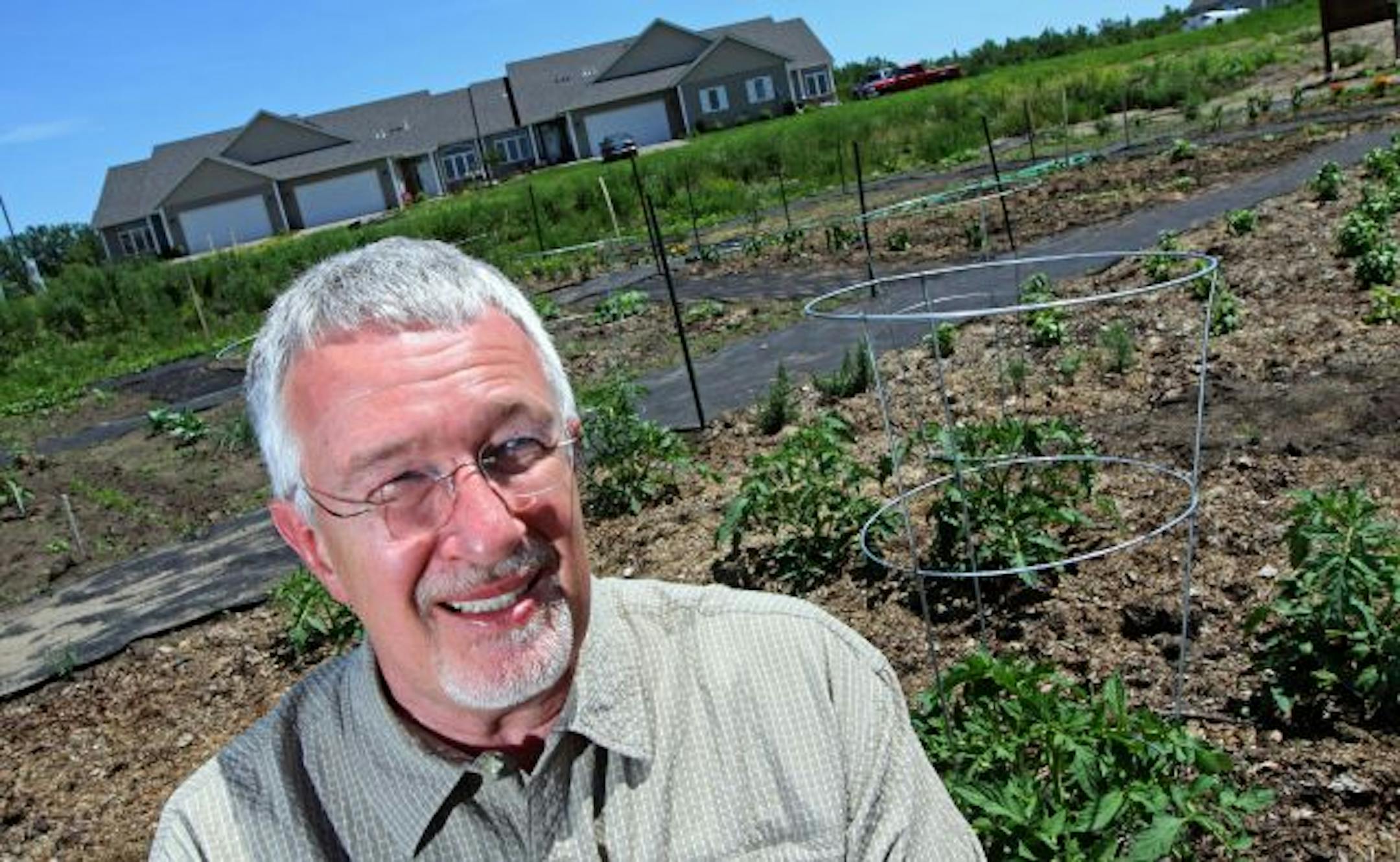 Builder Stephen Ayers suggested the alternate use of the empty lots at the Townhomes of Dawson Meadows in Farmington.