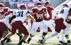 Arkansas center Frank Ragnow pass blocks against New Mexico State in the first half of an NCAA college football game in Fayetteville, Ark., Saturday, 
