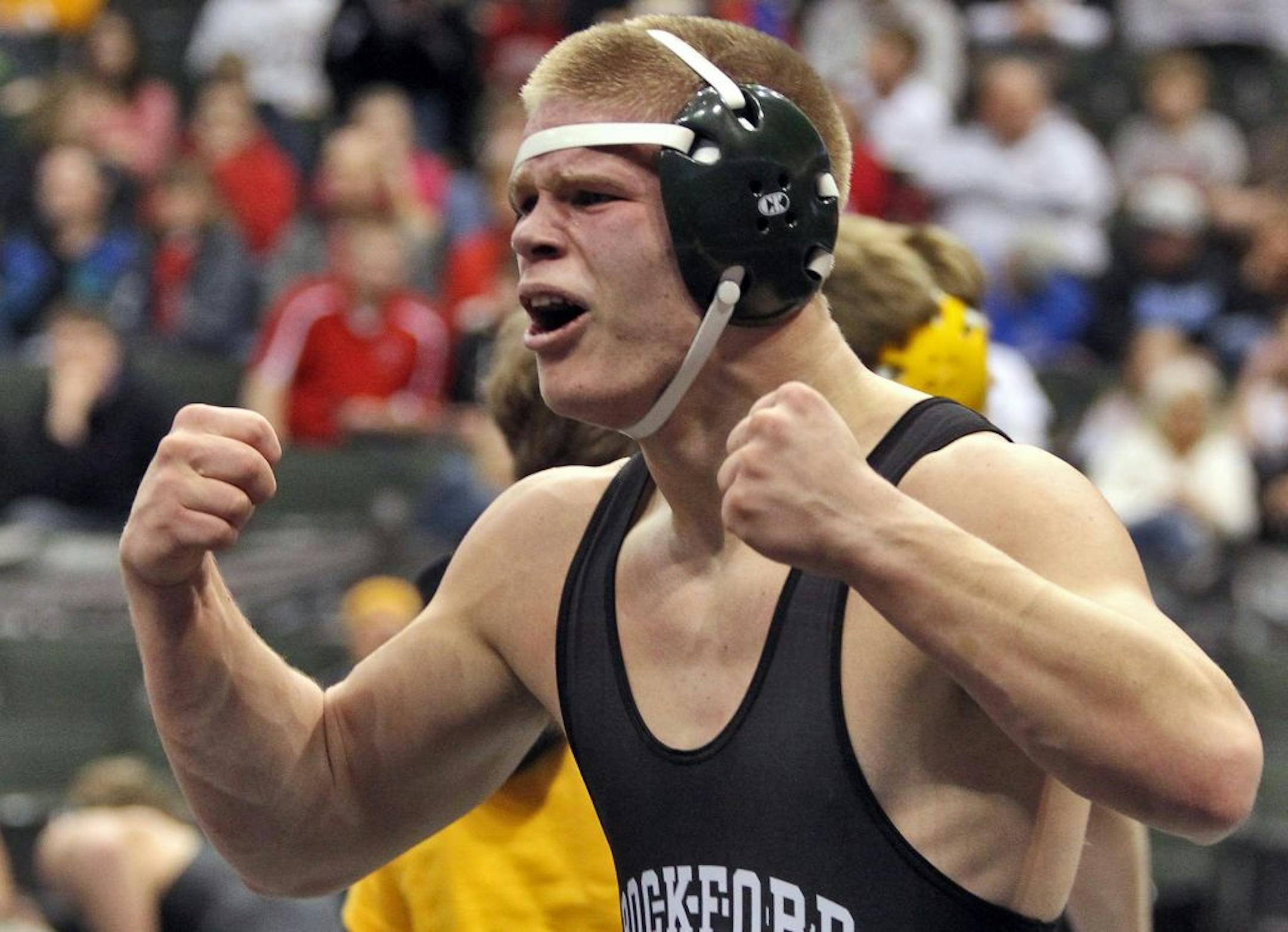 Prep state individual wrestling quarterfinal championships -John Redepenning of Rockford, wrestled Taylor Lewandowski of Foley in the Class 2A 160-lb match. Redepenning reacted to winning his match..
