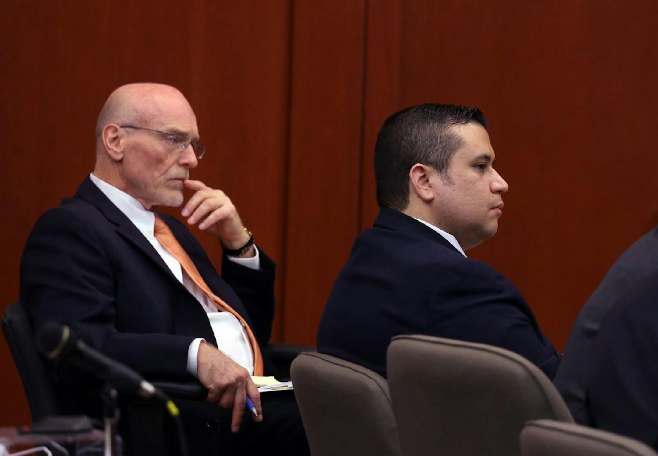 Co-counsel Don West, left, and George Zimmerman listen during potential juror questioning in Seminole circuit court on the fourth day of Zimmerman's trial in Sanford, Fla., Thursday, June 13, 2013.
