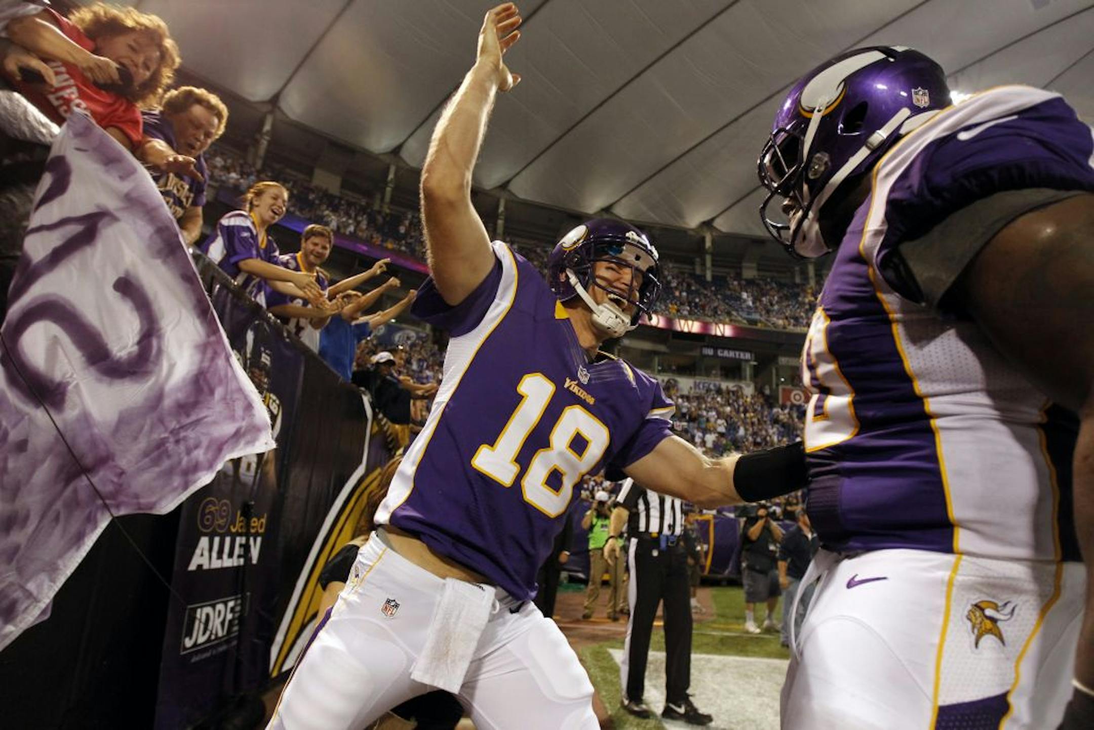Minnesota Vikings quarterback Sage Rosenfels (18)celebrated after throwing a touchdown during NFL preseason action between the Minnesota Vikings and the San Diego Chargers in Minneapolis , Minnesota Thursday August 23, 2012. San Diego beat Minnesota 12-10.