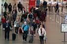 Passengers made their way through Terminal 1 to a TSA checkpoint Wednesday at MSP.