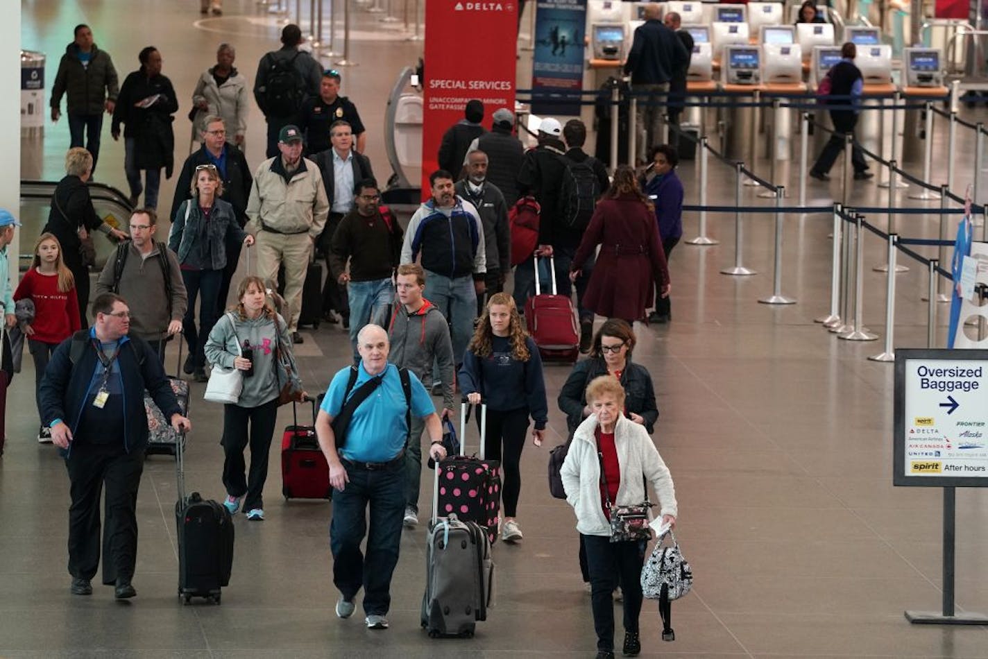 Passengers made their way through Terminal 1 to a TSA checkpoint Wednesday at MSP.