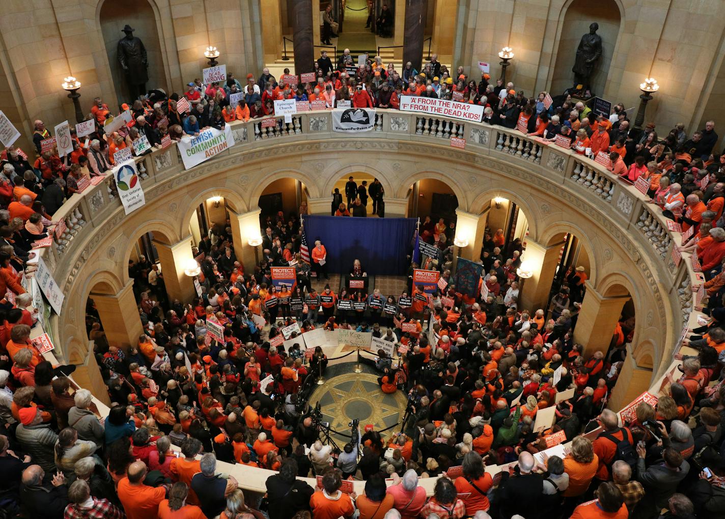 Advocates packed all three floors of the Minnesota State Capitol rotunda in St. Paul on Thursday during a rally calling for sensible gun laws sponsored by Protect Minnesota.