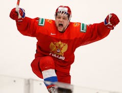 Russia's Alexander Khovanov celebrates after winning the U20 Ice Hockey Worlds semifinal match between Sweden and Russia in Ostrava, Czech Republic, S