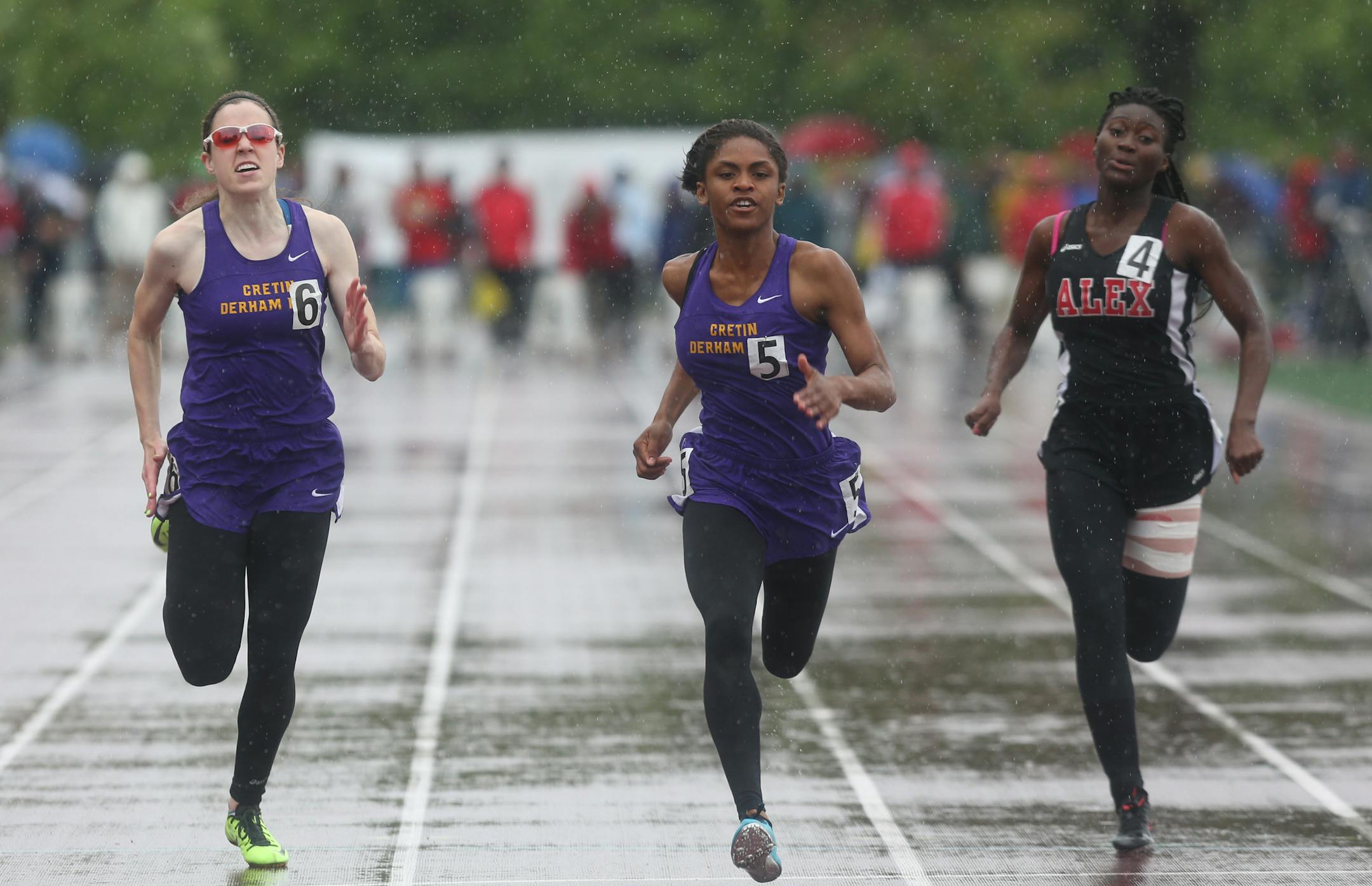 Cretin-Derham Hall Brieasha Hunter came in first with teammate Megan Linder a close second in the 100 meter dash ] (KYNDELL HARKNESS/STAR TRIBUNE) kyndell.harkness@startribune.com During the Class 2A state track and field meet at Hamilne University in St Paul, Min. Saturday, June 7, 2014.