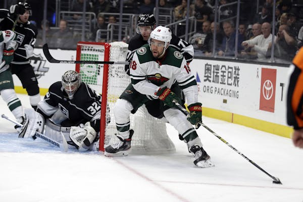 Minnesota Wild left wing Jordan Greenway (18) in action against the Los Angeles Kings during the third period of an NHL hockey game Tuesday, Nov. 12, 