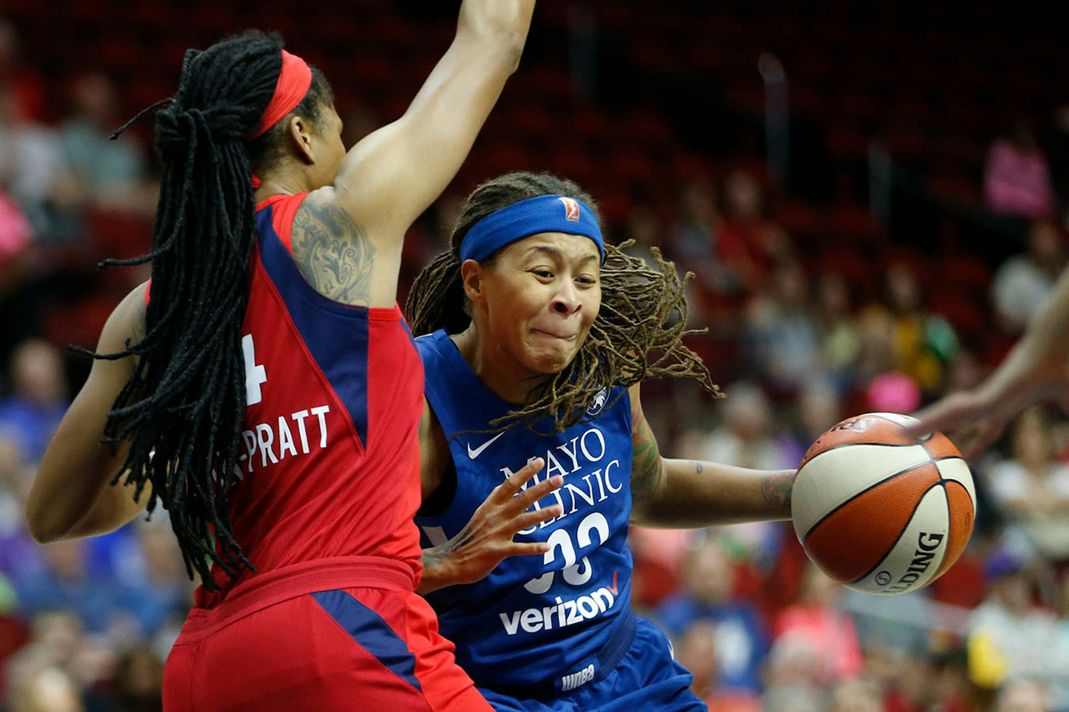 Lynx guard Seimone Augustus tried to drive past Mystics guard Tierra Ruffin-Pratt during the teams' WNBA preseason opener at Wells Fargo Arena in Des Moines on Sunday.